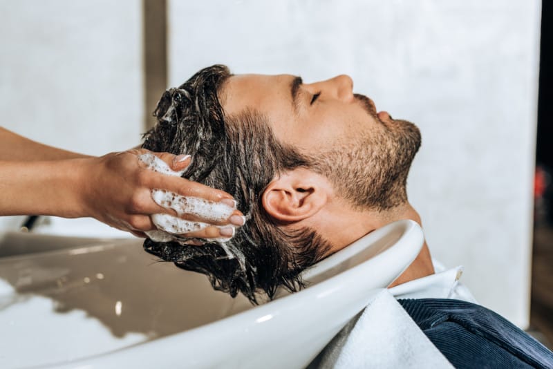 Stylist Washing Client's Hair